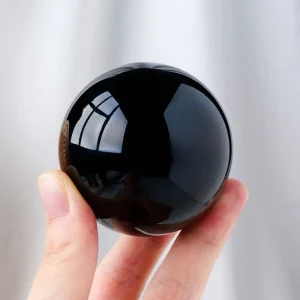 Natural obsidian crystal sphere